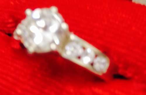 stamped 925 NV 9  * Sterling Nevada Silver mine size 9l  clear stone big middle each side 3 small