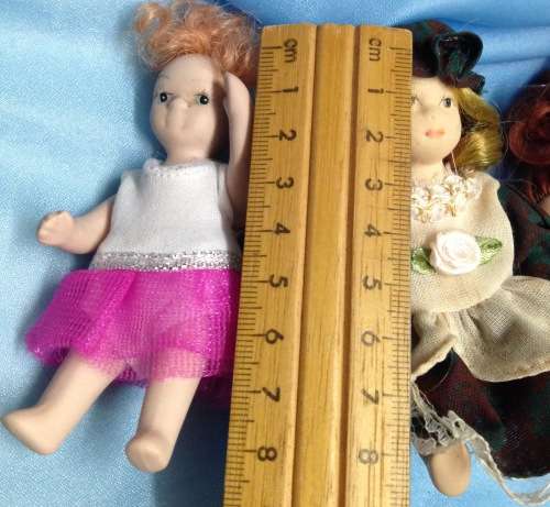 3 mix small dolls see pictures 2 porcelain 1 other