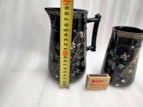 2 Graduating jugs ceramic larger one has been repaired Old