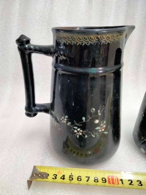2 Graduating jugs ceramic larger one has been repaired Old