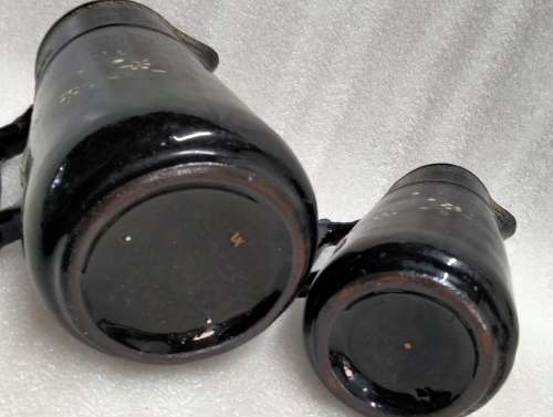 2 Graduating jugs ceramic larger one has been repaired Old