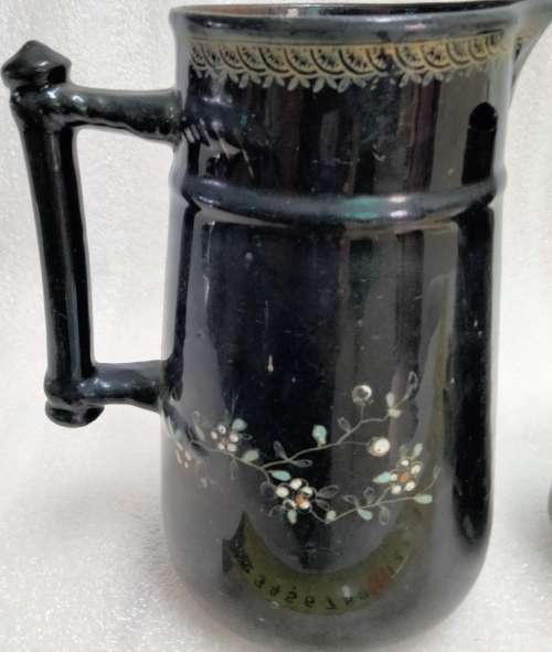 2 Graduating jugs ceramic larger one has been repaired Old
