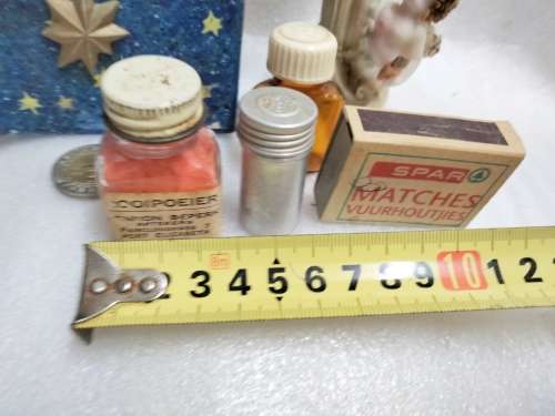 Bottle Rooipoier still some in box small tin bottle