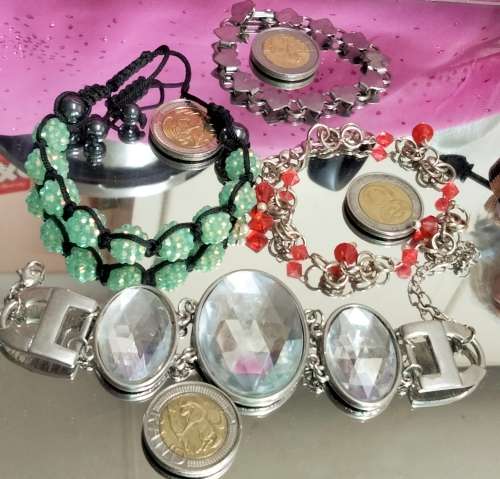 4 bracelets Artisinal 3 mix cord  beads  base metal charms Crylic crystals spacer all one bid