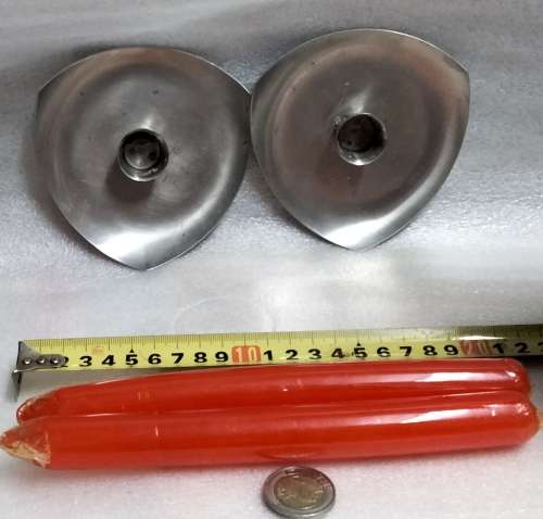 2 stainless steel candle holders and 2 red candles not used