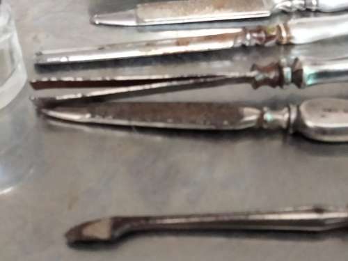 Antique box mixed pieces of Hallmarked Sterling SILVER manicure implements