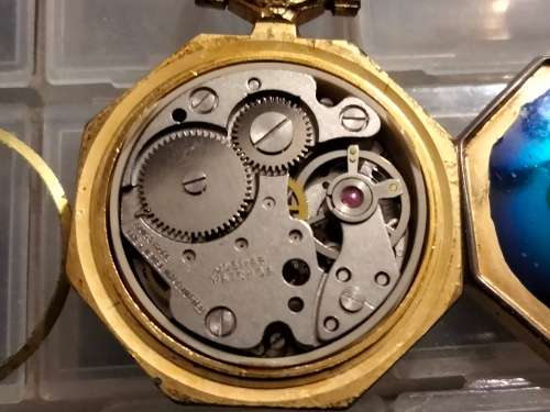 Watch -  not working*Pendant Jogmar has gold tone base metal back has enamel flower1 jewel swiss