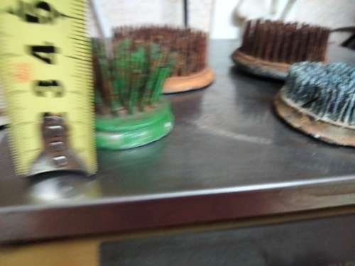 5 Metal flower frogs Assorted sizes and conditions not cleaned