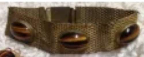 1 Bracelet has 3 Cabochon Tigers Eye on Gold tone mesh both edges sharp Look at my Buy Now NO WAITIN