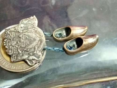 Circa 1960`sBROOCH GRAHAMSTOWN Coat of Arms 2 Dangling clogs charms made in HOLLAND