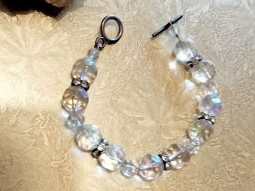 Bracelet - Rhinestones  Faceted Crystals cut glass spacer rondel sparkling refraction of light great