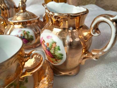 Romantic Couple  Porcelain Tea Set Showing ware to gilt coating-Damage LOOK At My BUY NOW NO WAITING