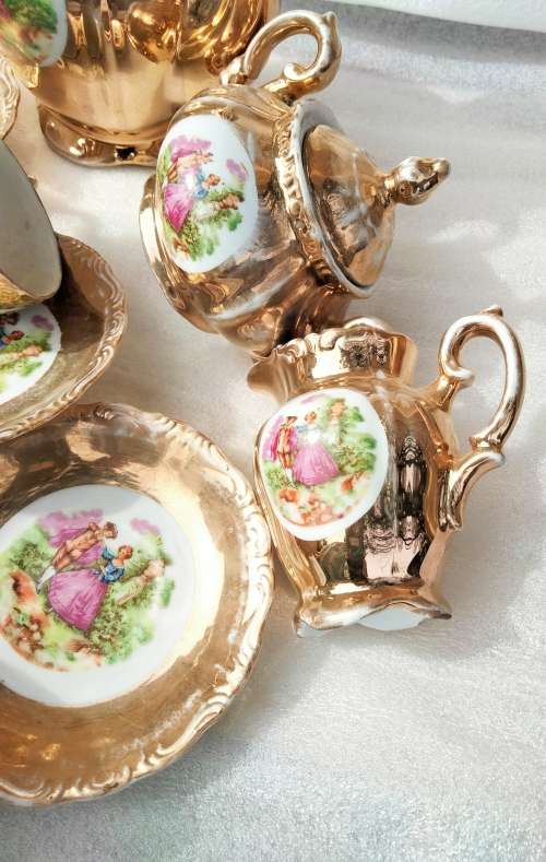 Romantic Couple  Porcelain Tea Set Showing ware to gilt coating-Damage LOOK At My BUY NOW NO WAITING