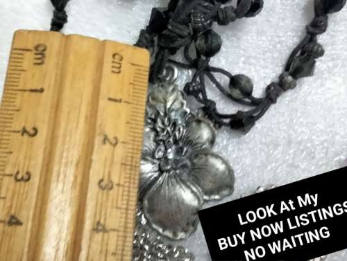 NECKLACE -Flower Silver Tone Metal small central stone Cord has black faceted beads LOOK At My BUY