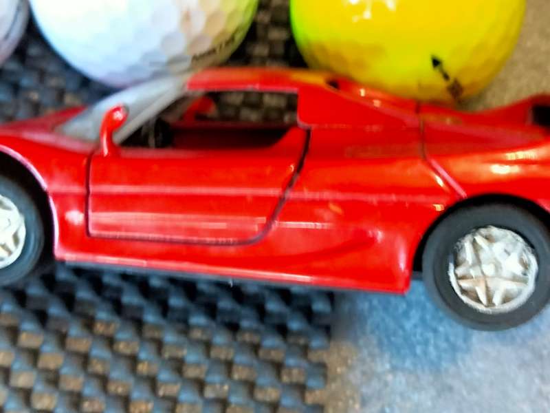 12 Toys Ferrari F50 9721 Die Cast Car+Darts+Golf balls+Mini ICC cricket bat2003