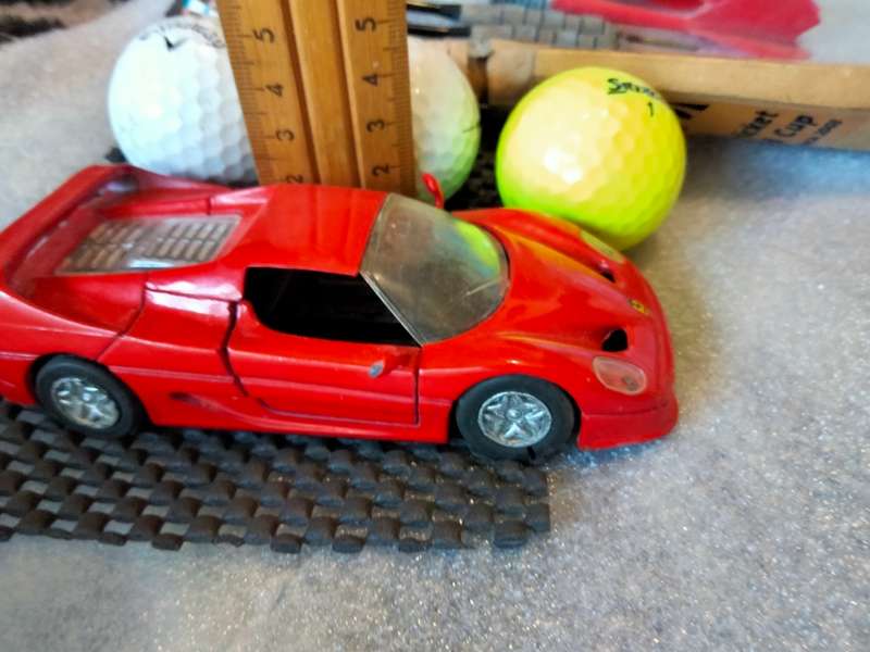 12 Toys Ferrari F50 9721 Die Cast Car+Darts+Golf balls+Mini ICC cricket bat2003