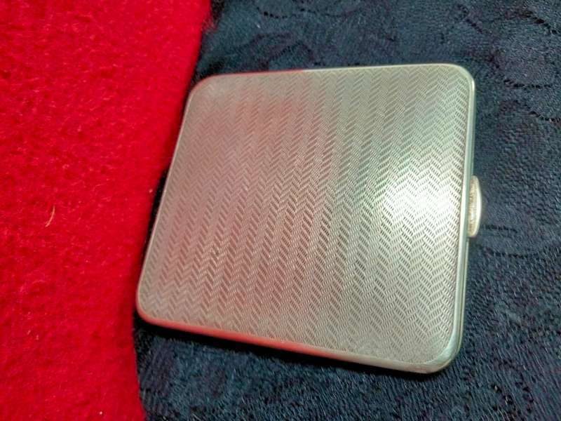 Cigarette case hinged  pattern fishermans rib engine turned decor silver tone metal