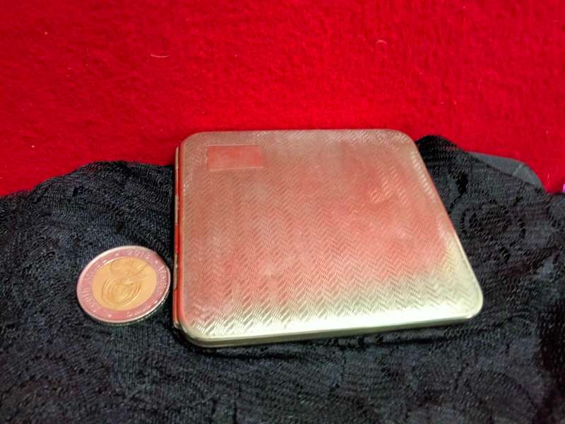 Cigarette case hinged  pattern fishermans rib engine turned decor silver tone metal