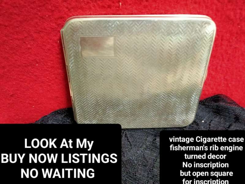 Cigarette case hinged  pattern fishermans rib engine turned decor silver tone metal