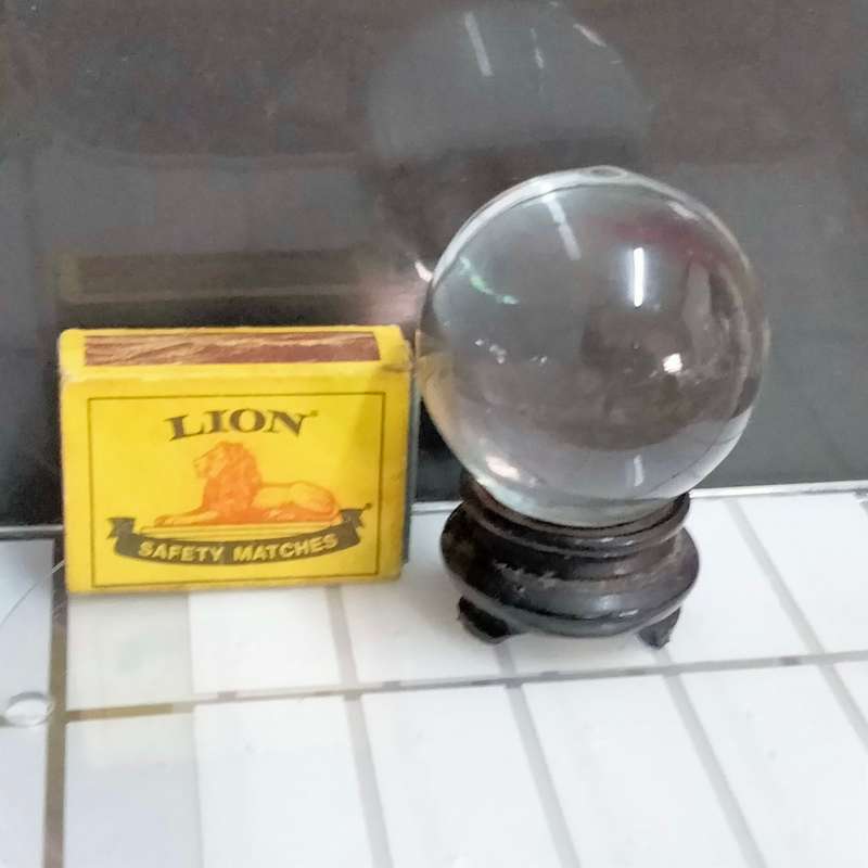 ORB glass flat bottom on oriental plinth Art GLASS one side Mary