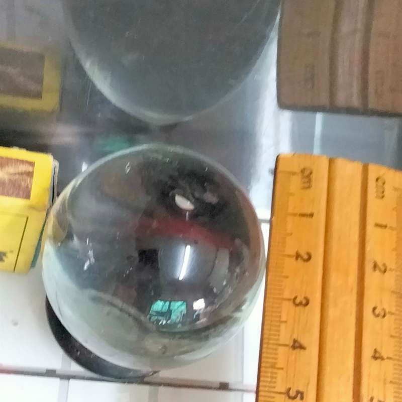 ORB glass flat bottom on oriental plinth Art GLASS one side Mary