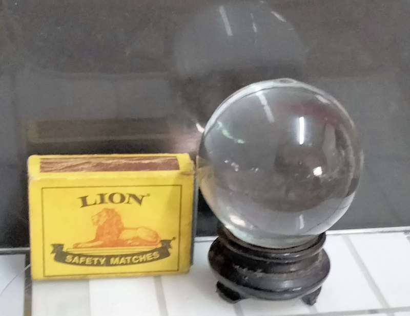 ORB glass flat bottom on oriental plinth Art GLASS one side Mary