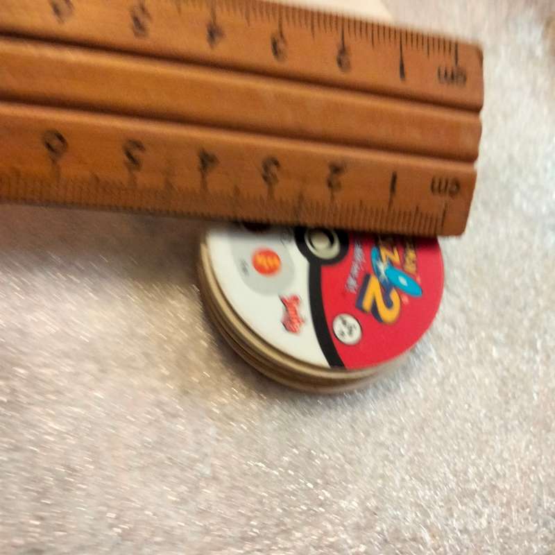 7 Pokémon Tazos + 1 other from another collection to yours
