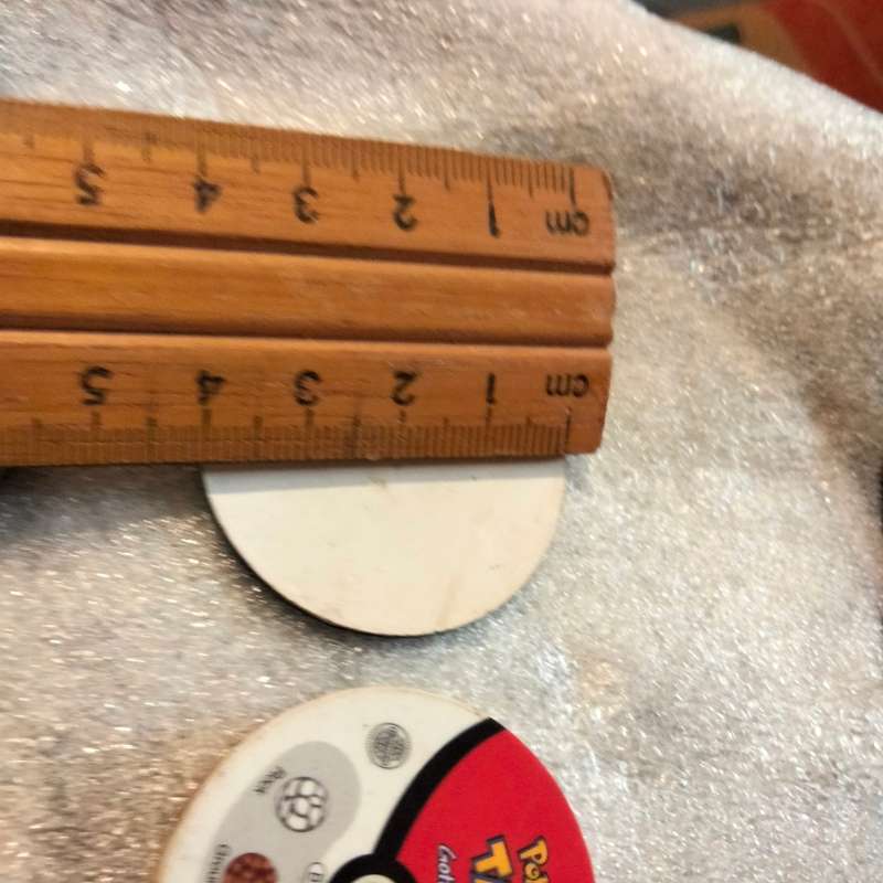 7 Pokémon Tazos + 1 other from another collection to yours
