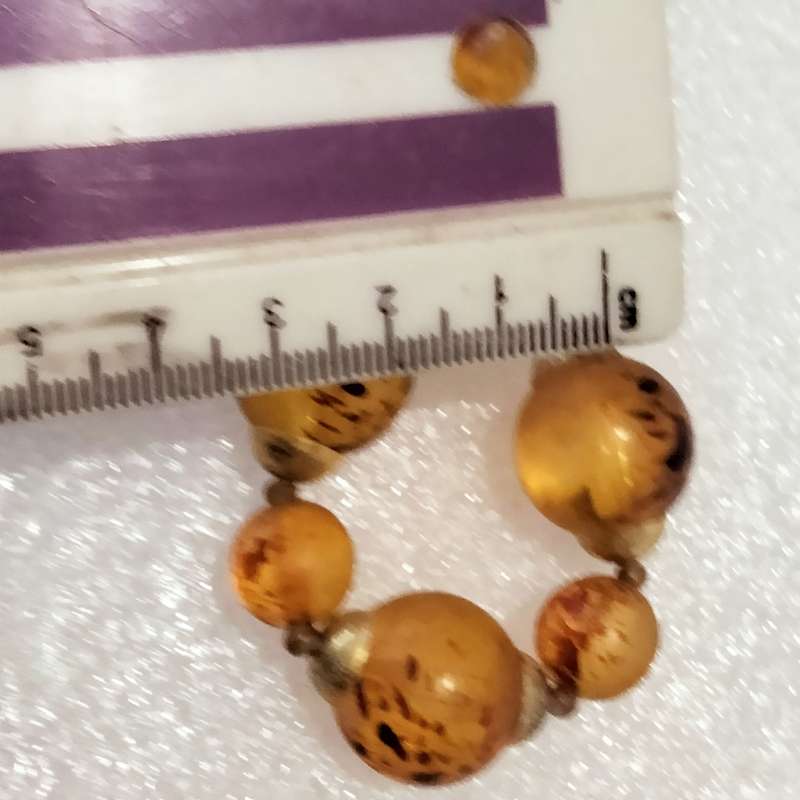 Necklace  AMBER graduating faux round beads+ small beads gold tone metal spacers + barrel clasp