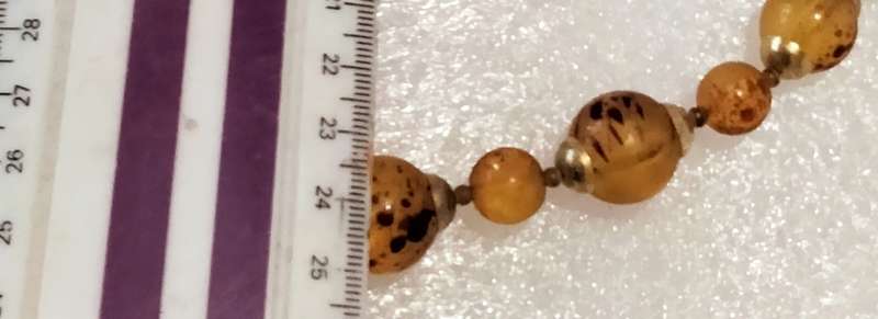Necklace  AMBER graduating faux round beads+ small beads gold tone metal spacers + barrel clasp
