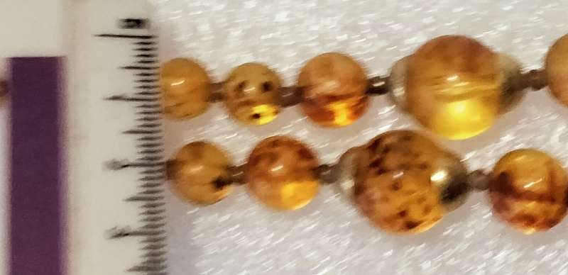 Necklace  AMBER graduating faux round beads+ small beads gold tone metal spacers + barrel clasp