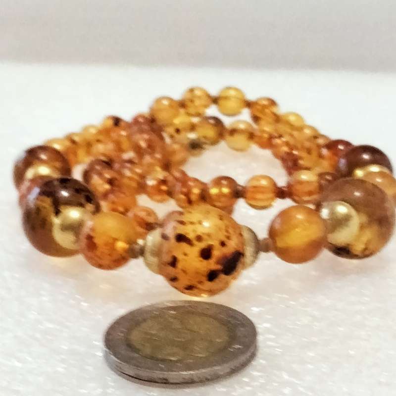 Necklace  AMBER graduating faux round beads+ small beads gold tone metal spacers + barrel clasp