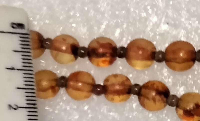 Necklace  AMBER graduating faux round beads+ small beads gold tone metal spacers + barrel clasp