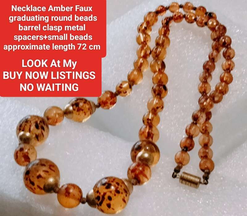 Necklace  AMBER graduating faux round beads+ small beads gold tone metal spacers + barrel clasp