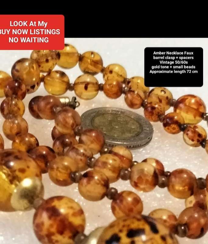 Necklace  AMBER graduating faux round beads+ small beads gold tone metal spacers + barrel clasp
