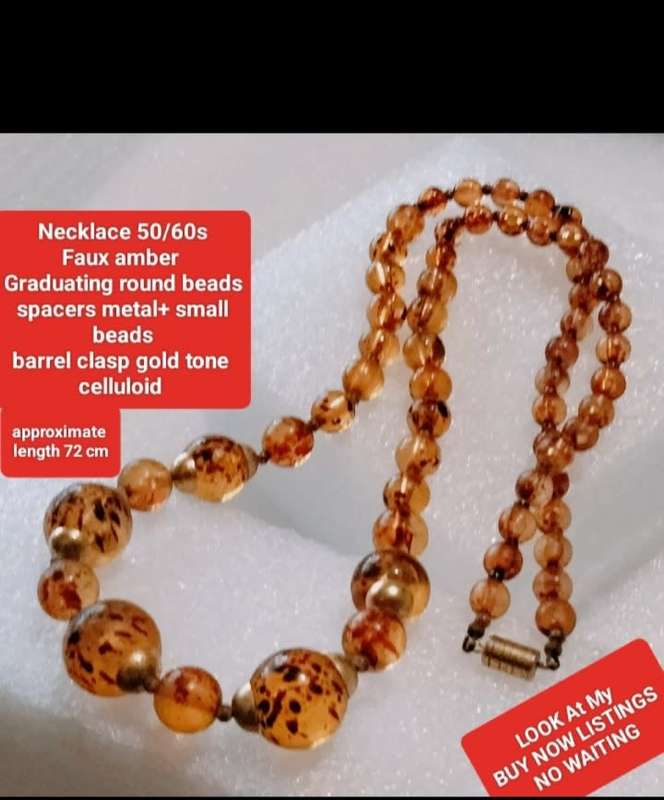 Necklace  AMBER graduating faux round beads+ small beads gold tone metal spacers + barrel clasp