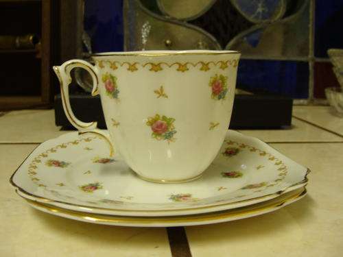 2 small ART DECO SHAPE CAKE PLATES +1 CUP "ROSLYN"fine Bone China Decorated with flowers VERY PRETTY