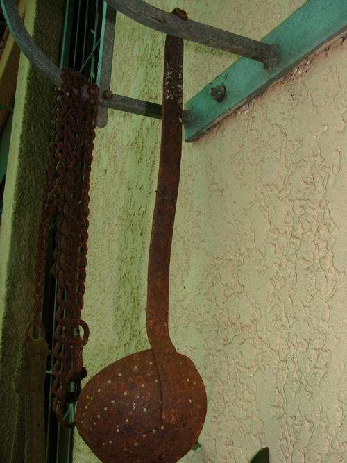 LADDLE /SIEVE  THIS OLD THING HAS LOST ALL IT ENAMEL- VERY RUSTY IDEAL FOR GARDEN BRAAI AREA