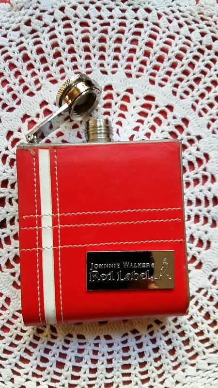 FOR THE COLLECTOR : JOHNNY WALKER RED LABEL HIP FLASK WITH STITCHED LEATHER EXTERIOR,  AND BADGE