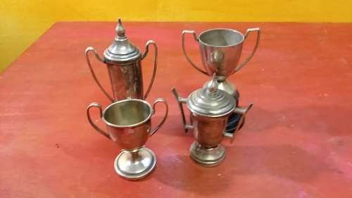SET OF 4 MINIATURE VINTAGE TROPHIES
