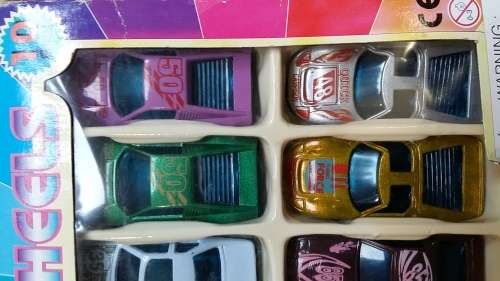 FOR THE COLLECTOR : AS NEW, UNSCRATCHED PRISTINE CONDITION  SET OF 10 DIE-CAST METAL CARS IN BOX SET