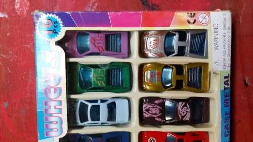 FOR THE COLLECTOR : AS NEW, UNSCRATCHED PRISTINE CONDITION  SET OF 10 DIE-CAST METAL CARS IN BOX SET