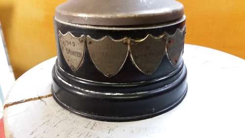 LARGE VINTAGE TROPHY WITH BADGES