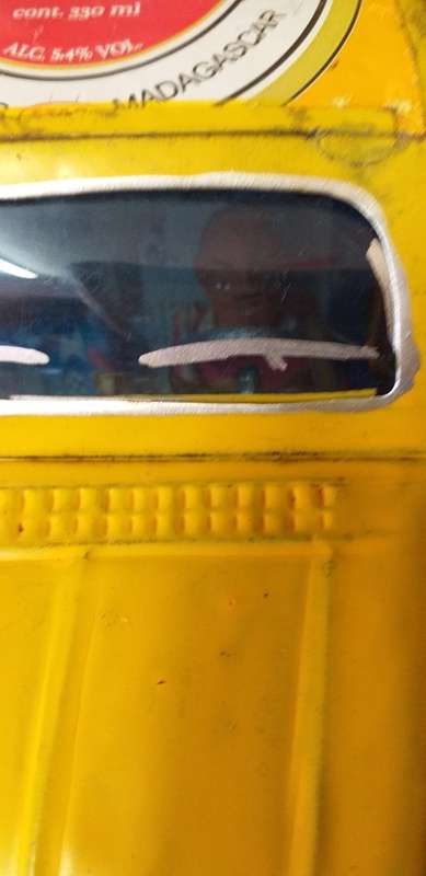 Yellow Heinekin VW Beetle Tin Car imported from Madagascar