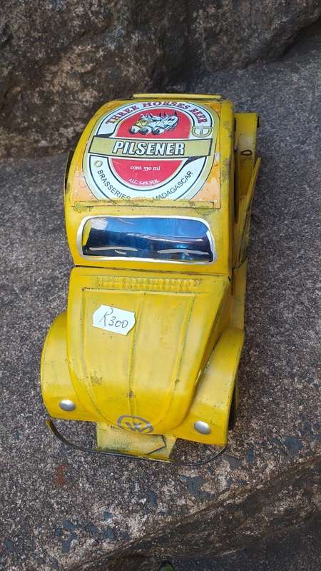 Yellow Heinekin VW Beetle Tin Car imported from Madagascar