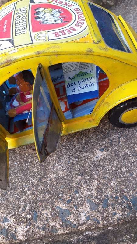 Yellow Heinekin VW Beetle Tin Car imported from Madagascar