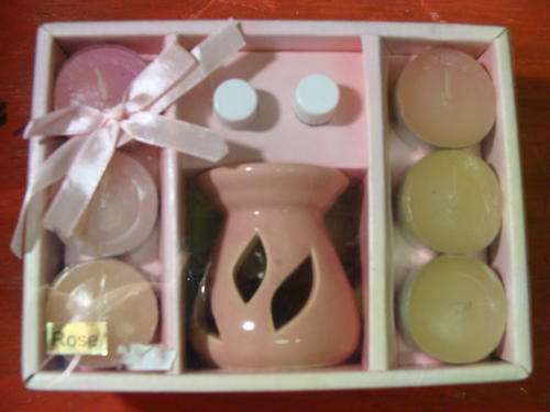 ROSE OIL BURNER, 6 TEALIGHT CANDLES AND 2 VIALS OF ROSE OIL AT A GREAT PRICE!!!