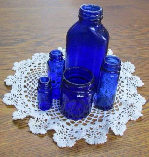 COLLECTION OF 5 BLUE BOTTLES