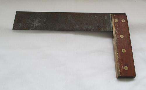 VINTAGE UNMARKED WOOD AND BRASS SQUARE