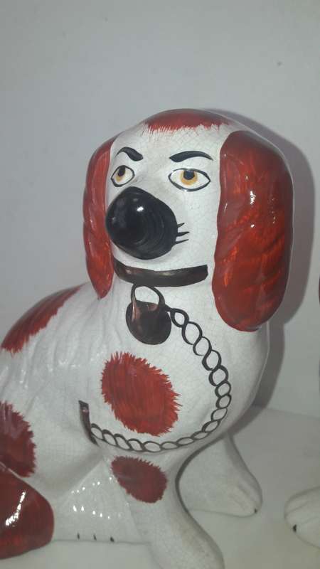 Pair of Staffordshire King Charles spaniels earthenware 20th Century